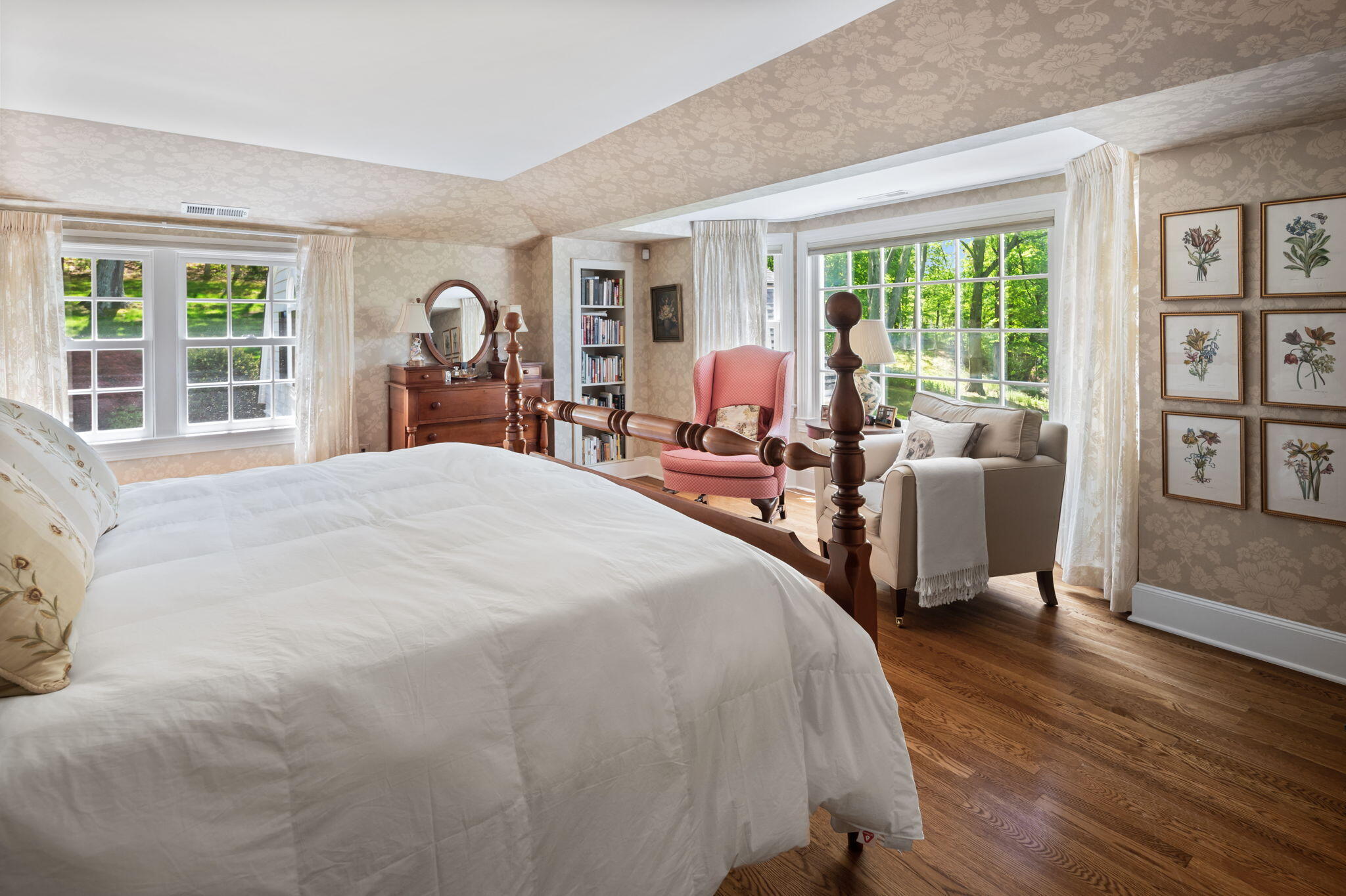1466 Ponus Ridge Road New Canaan, CT 06840 - Photo 42 of 81 a bedroom with a bed large windows and wooden floor