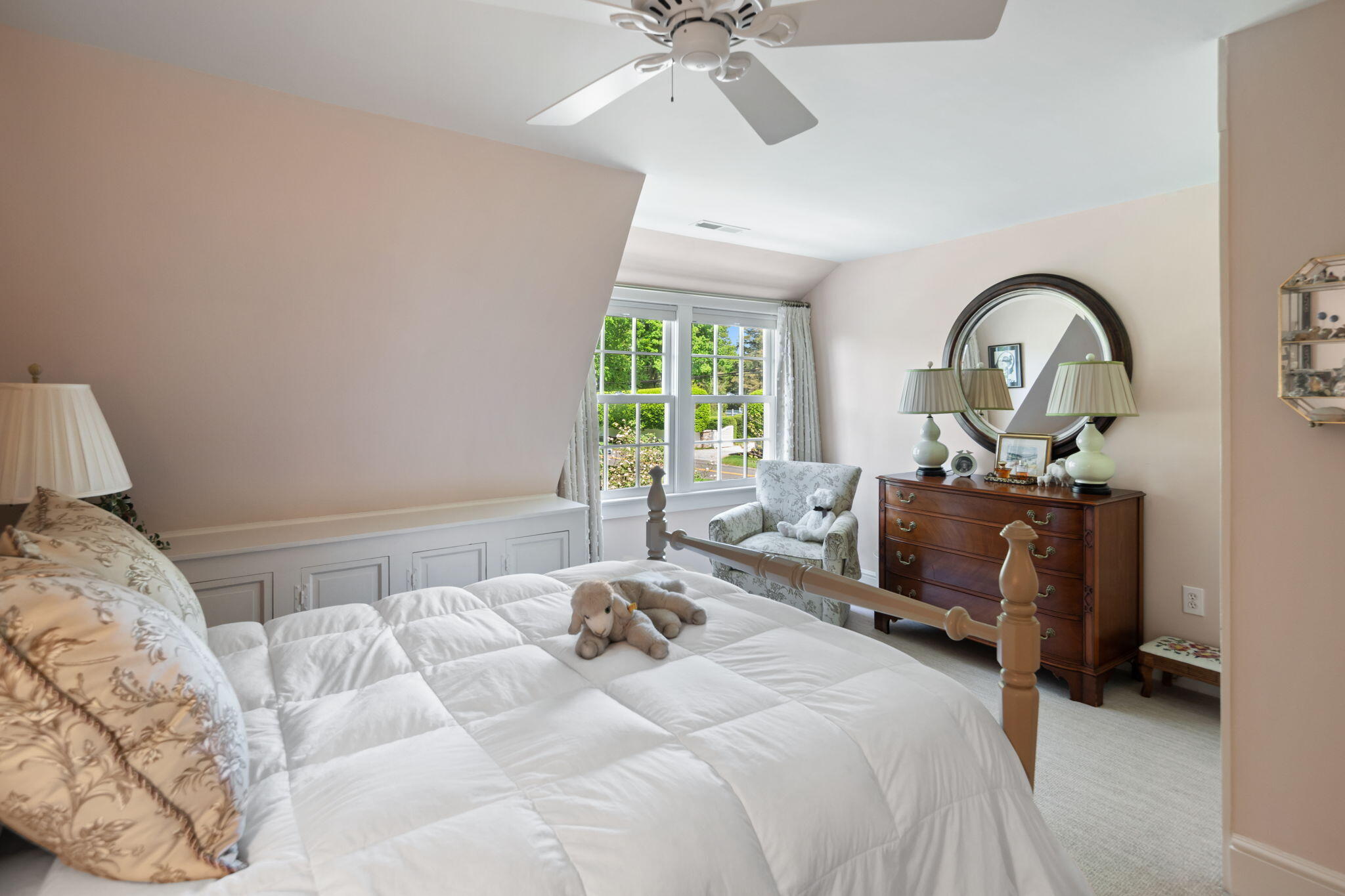 1466 Ponus Ridge Road New Canaan, CT 06840 - Photo 47 of 81 a bedroom with a bed and a large window