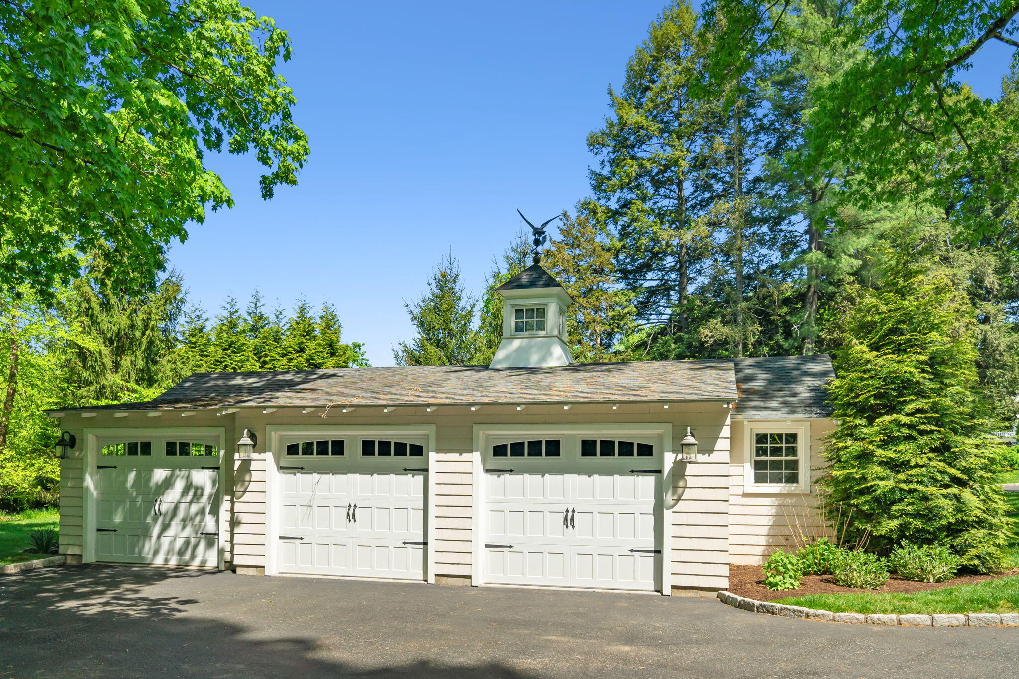 1466 Ponus Ridge Road New Canaan, CT 06840 - Photo 76 of 81 a view of a house with a tree