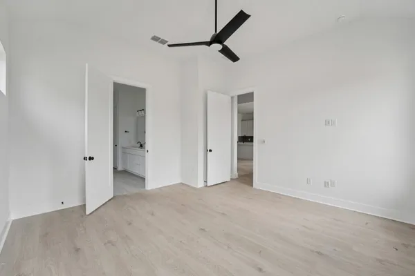 a lobby with furniture and a table