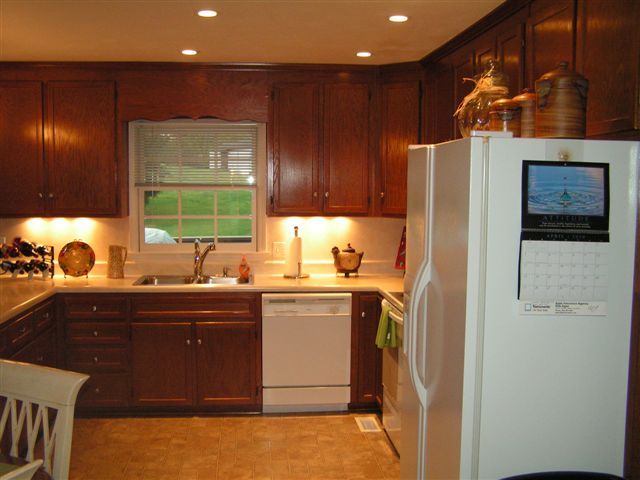 115 Stonebridge Drive Blue Ridge, VA 24064 - Photo 14 of 64 a kitchen with stainless steel appliances granite countertop a refrigerator and a sink