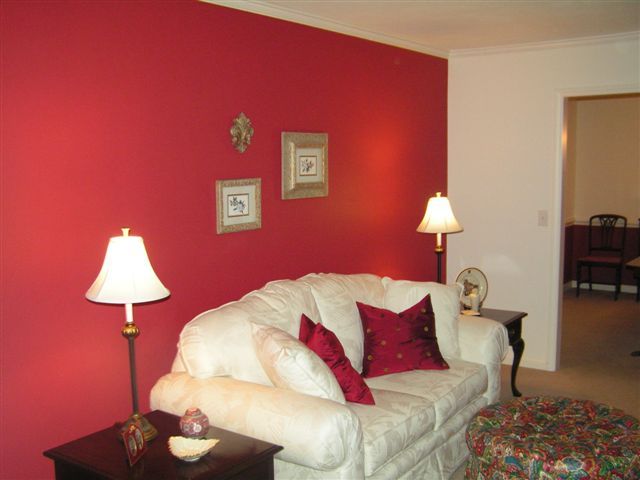 115 Stonebridge Drive Blue Ridge, VA 24064 - Photo 18 of 64 a bed room with a bed and a lamp