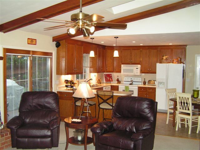 115 Stonebridge Drive Blue Ridge, VA 24064 - Photo 21 of 64 a living room with lots of furniture and a large window