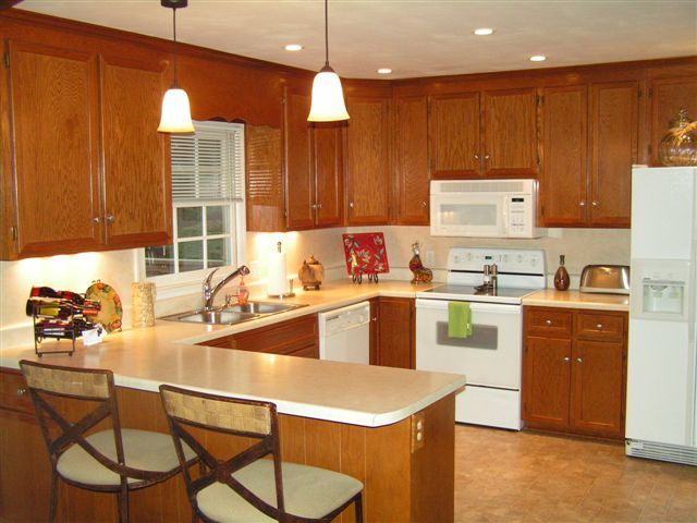 115 Stonebridge Drive Blue Ridge, VA 24064 - Photo 23 of 64 a kitchen with a sink cabinets and window
