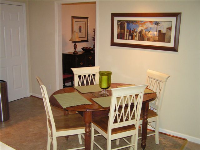 115 Stonebridge Drive Blue Ridge, VA 24064 - Photo 24 of 64 a view of a dining room with furniture and wooden floor