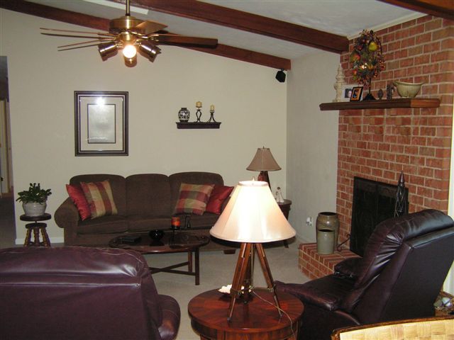 115 Stonebridge Drive Blue Ridge, VA 24064 - Photo 25 of 64 a living room with furniture and a fireplace