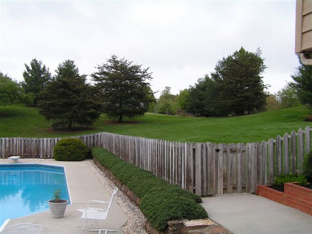 115 Stonebridge Drive Blue Ridge, VA 24064 - Photo 6 of 64 a view of deck with white house and outdoor space