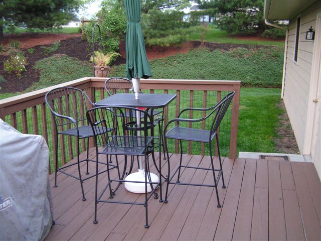 115 Stonebridge Drive Blue Ridge, VA 24064 - Photo 62 of 64 a view of a deck with a table and chairs