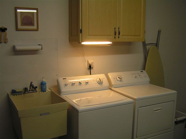 115 Stonebridge Drive Blue Ridge, VA 24064 - Photo 63 of 64 a utility room with dryer and washer