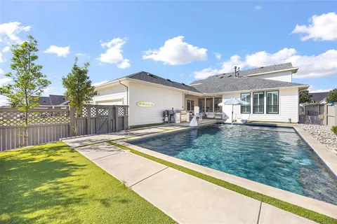 a view of a house with a swimming pool