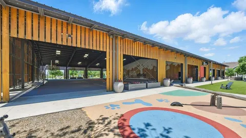 a view of swimming pool with outdoor seating