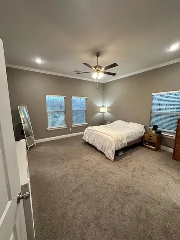 a kitchen with kitchen island granite countertop a sink a counter top space and living room view
