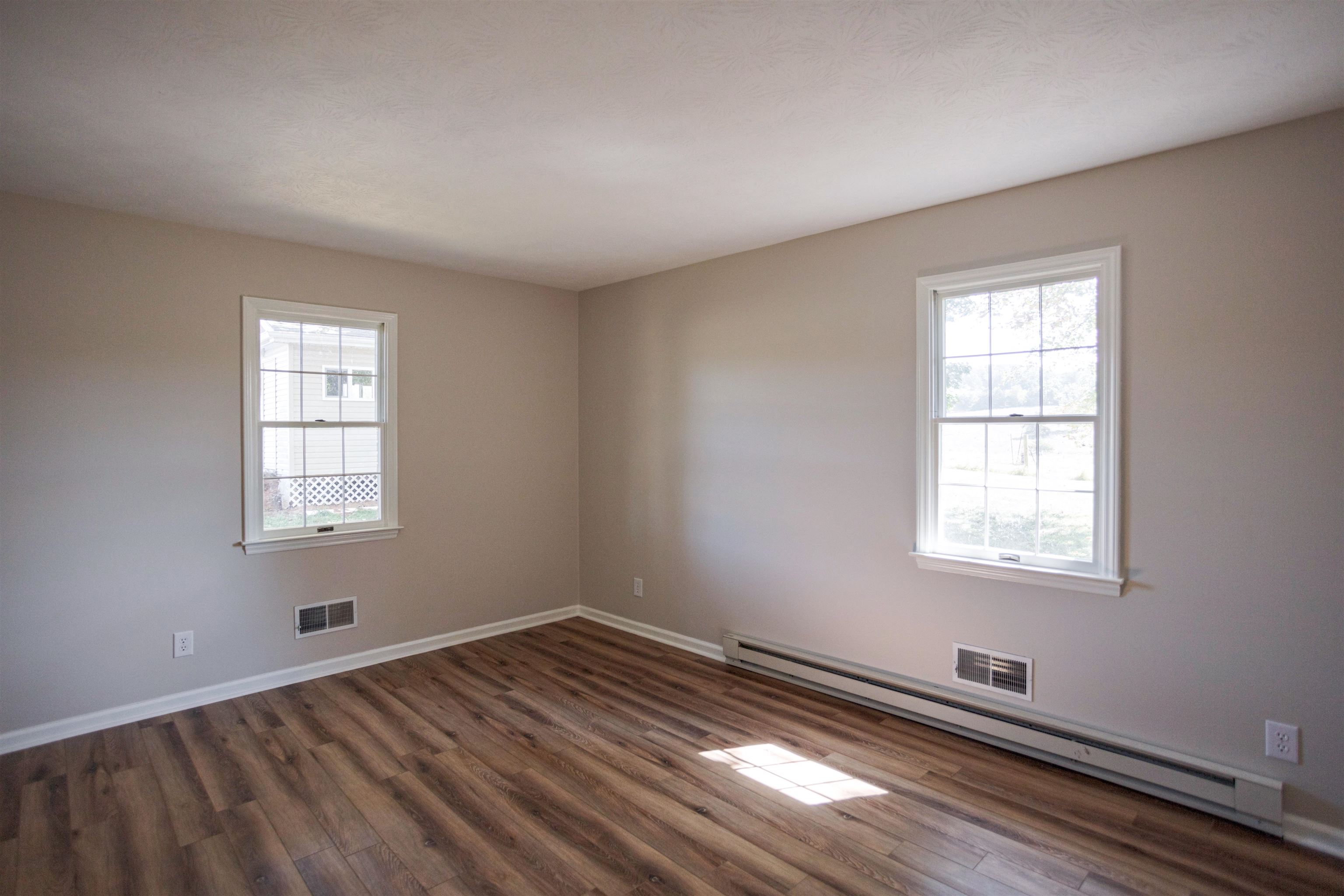 2834 Brownsburg Turnpike Raphine, VA 24472 - Photo 15 of 69 a view of a room with wooden floor and windows