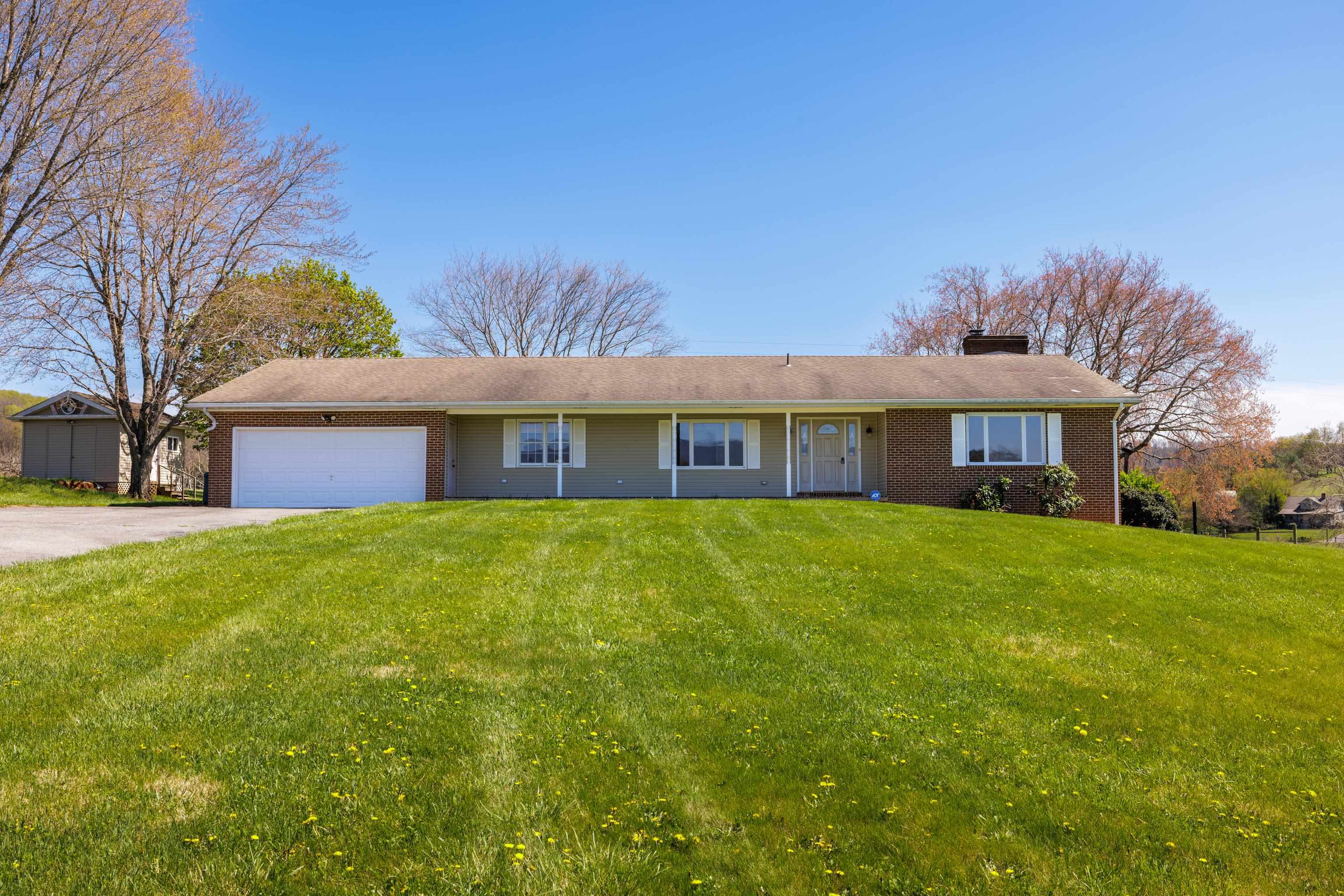 2834 Brownsburg Turnpike Raphine, VA 24472 - Photo 2 of 69 a front view of house with yard and green space