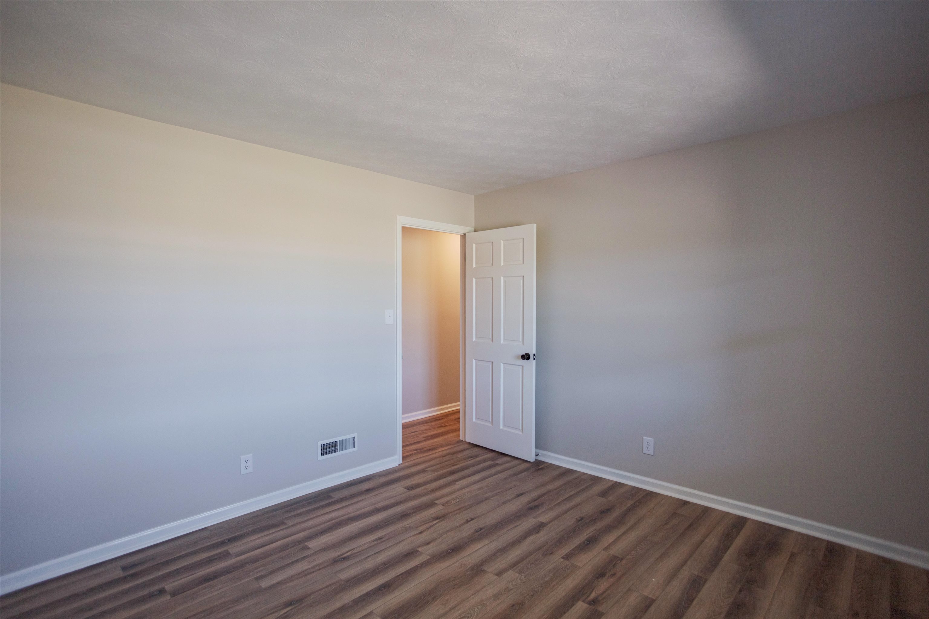 2834 Brownsburg Turnpike Raphine, VA 24472 - Photo 21 of 38 a view of an empty room with wooden floor