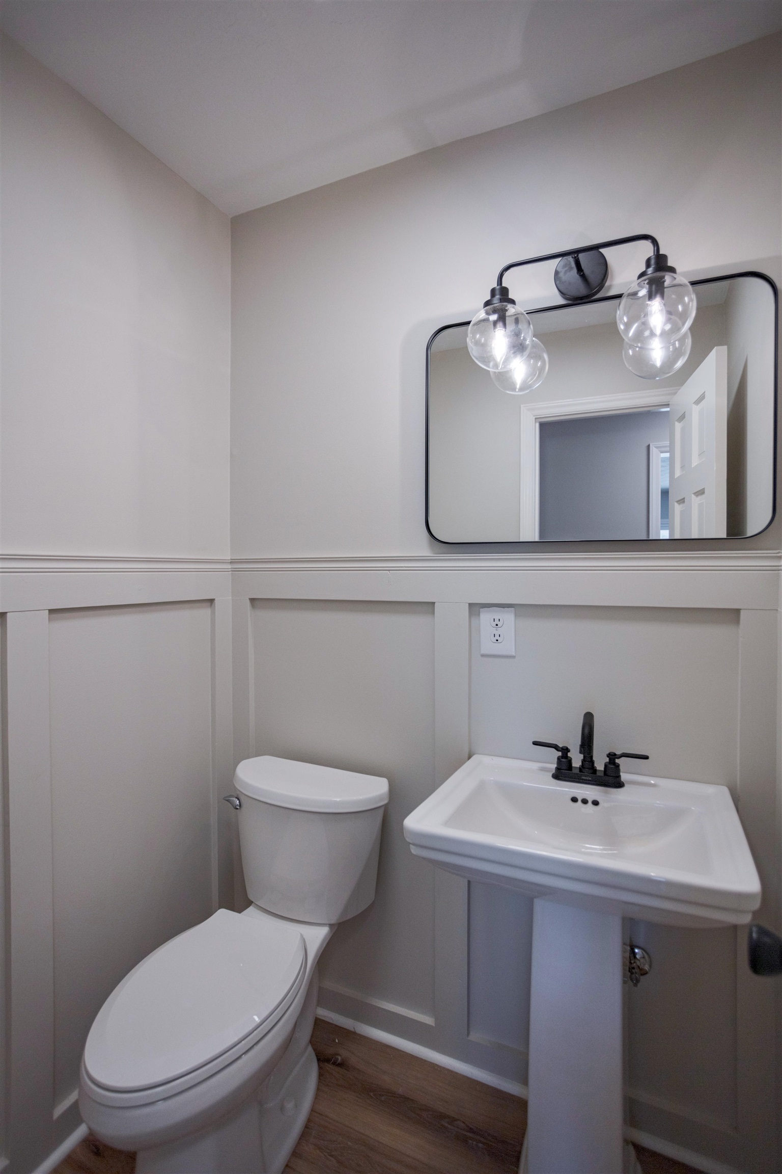 2834 Brownsburg Turnpike Raphine, VA 24472 - Photo 25 of 69 a bathroom with a sink a toilet and mirror
