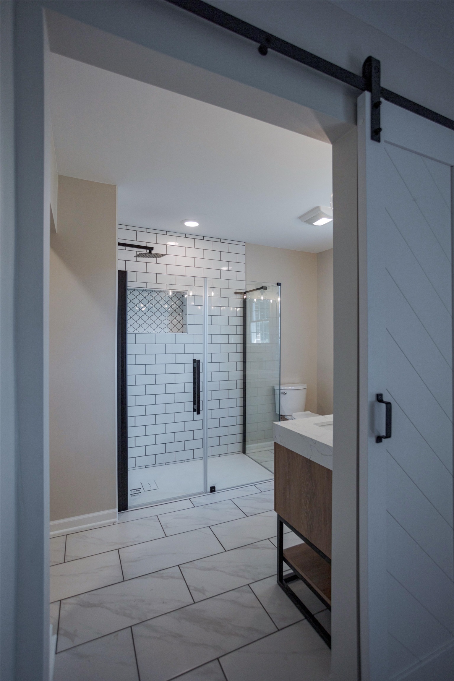 2834 Brownsburg Turnpike Raphine, VA 24472 - Photo 30 of 38 a bathroom with a shower and a sink