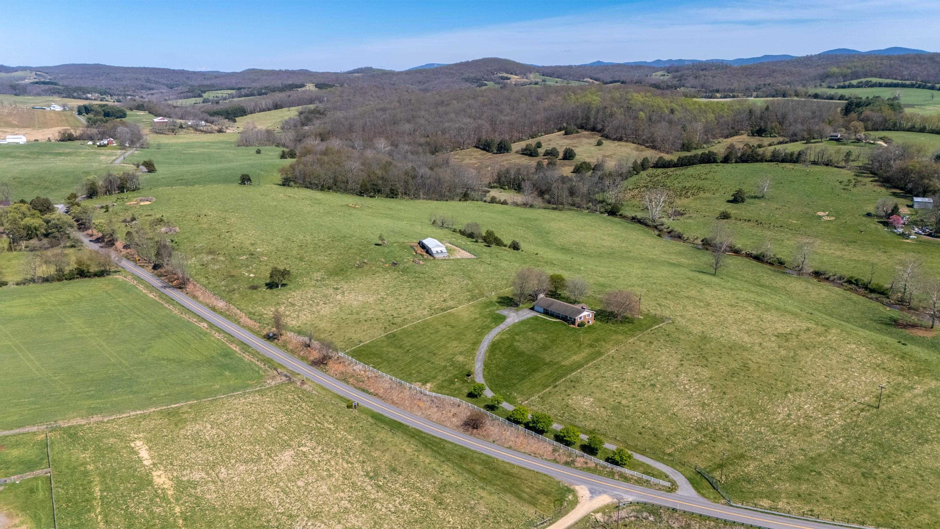 2834 Brownsburg Turnpike Raphine, VA 24472 - Photo 67 of 69 an aerial view of a house with a garden and mountains view