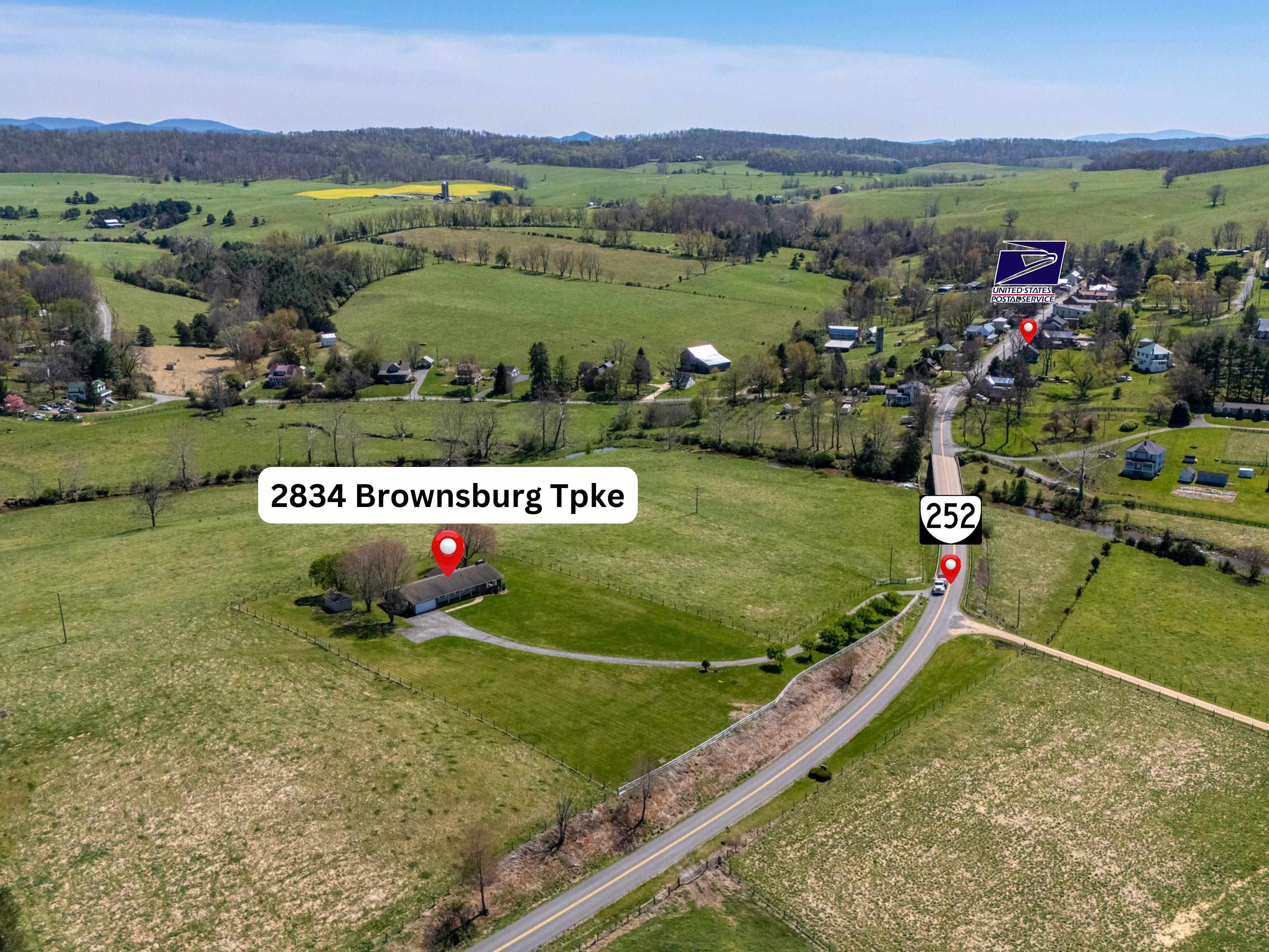 2834 Brownsburg Turnpike Raphine, VA 24472 - Photo 69 of 69 an aerial view of a house with a garden and lake view