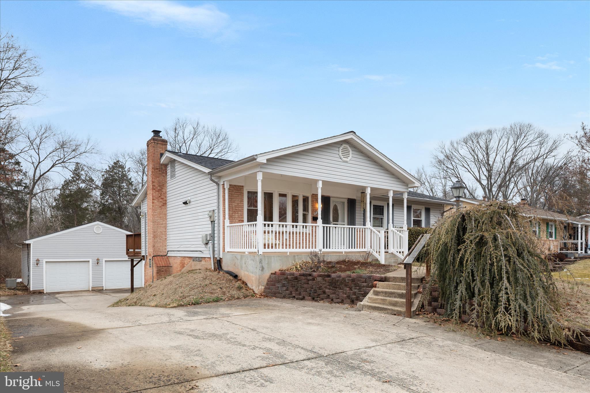 7398 Roxbury Avenue Manassas, VA 20109 - Photo 2 of 75 a view of a house with a yard