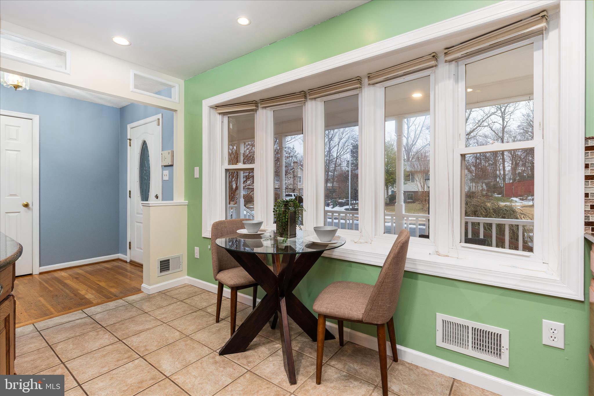 7398 Roxbury Avenue Manassas, VA 20109 - Photo 4 of 75 a view of a dining room with furniture window and outside view