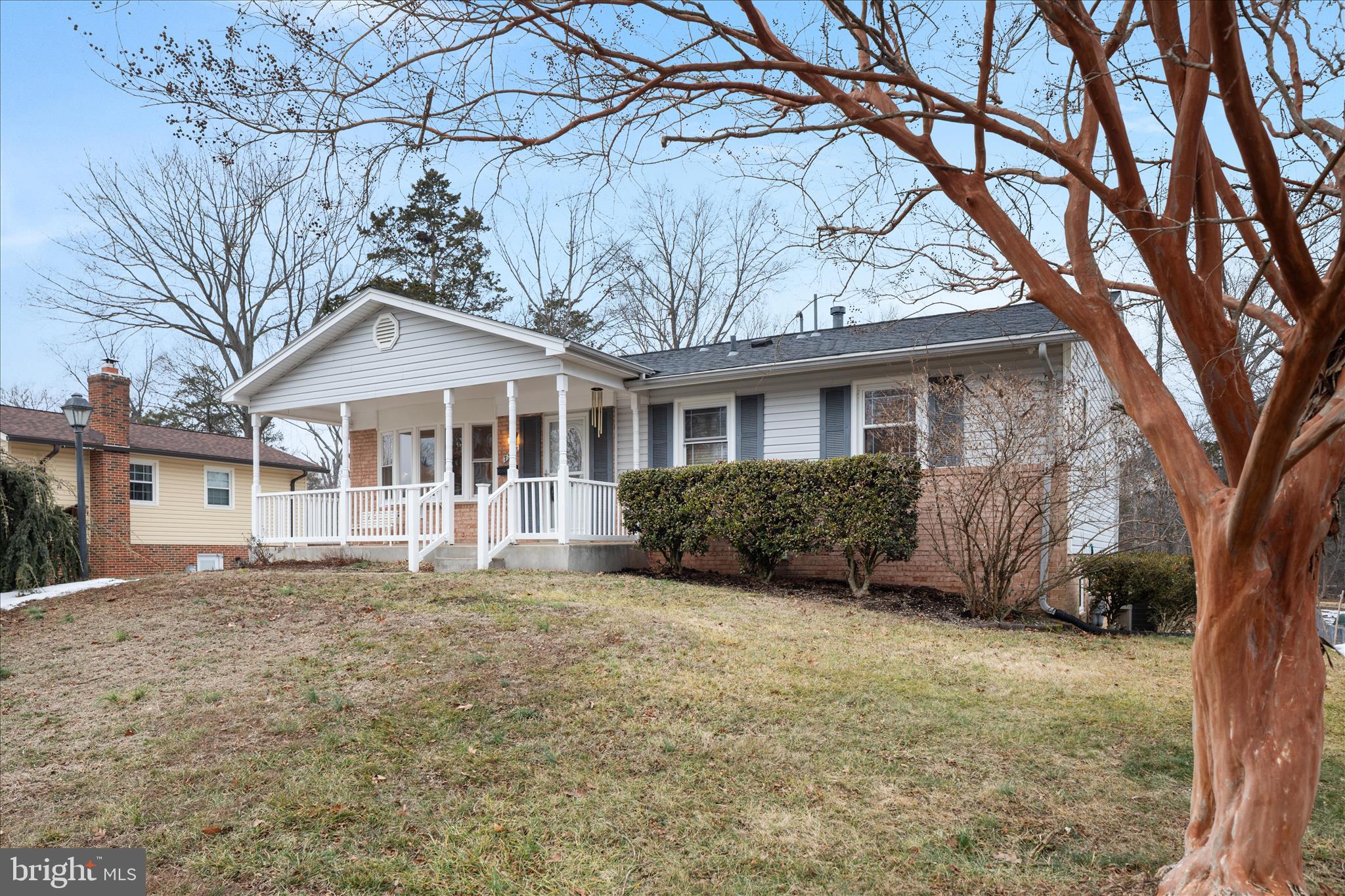 7398 Roxbury Avenue Manassas, VA 20109 - Photo 46 of 75 a front view of a house with a garden
