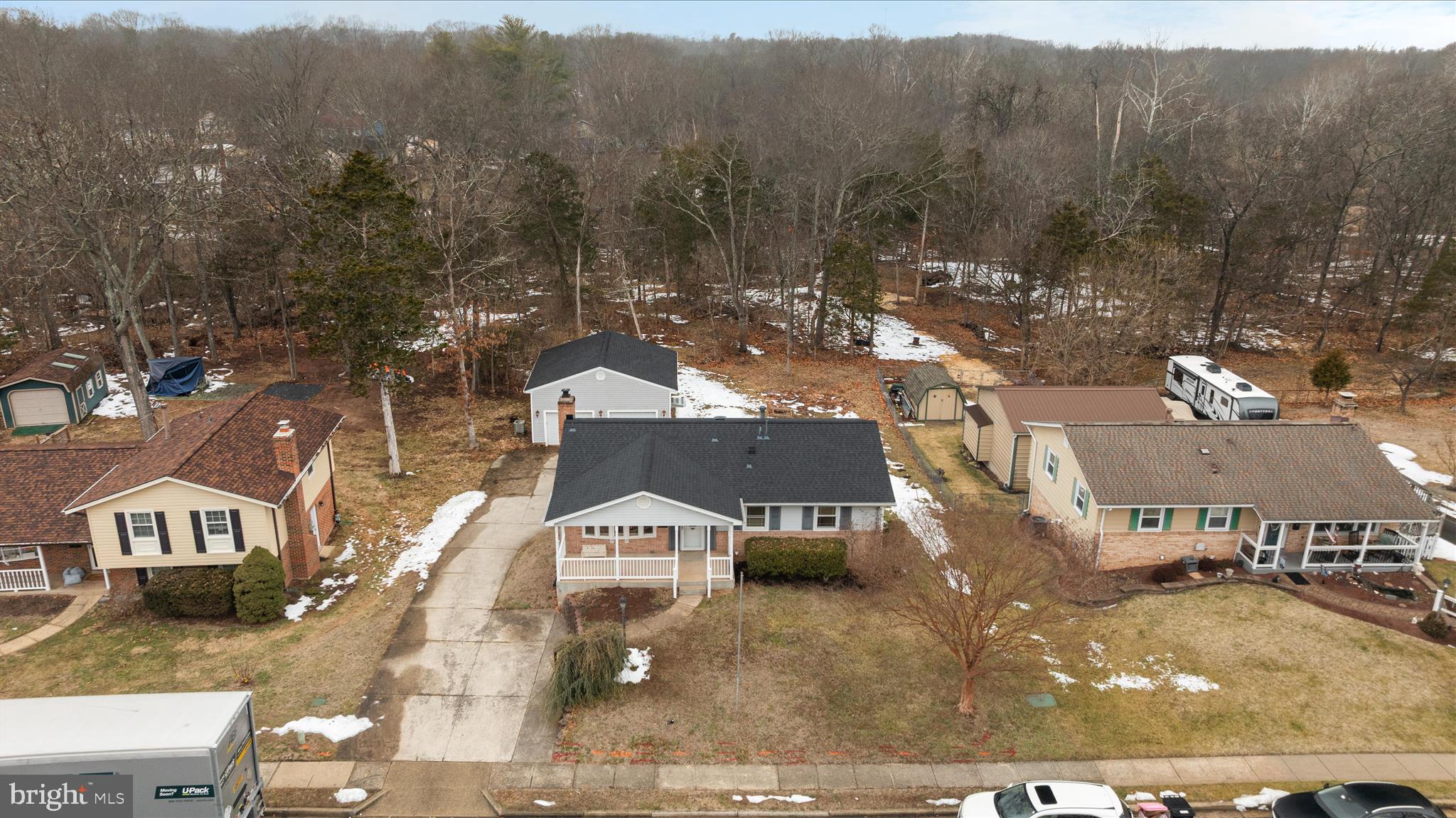 7398 Roxbury Avenue Manassas, VA 20109 - Photo 59 of 75 an aerial view of a house with a mountain in the background