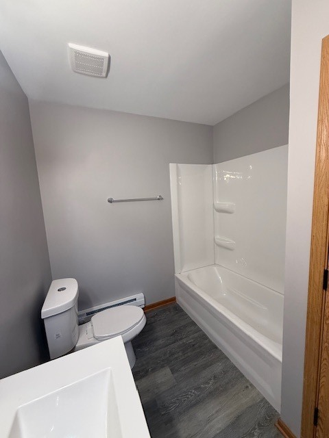 1351 Monomoy Street, Unit D Aurora, IL 60506 - Photo 12 of 14 a bathroom with a toilet and a bathtub
