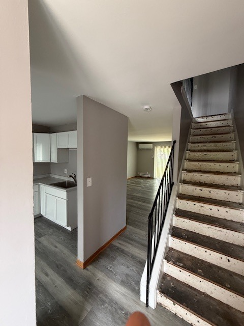 1351 Monomoy Street, Unit D Aurora, IL 60506 - Photo 3 of 14 a hallway with a white cabinets