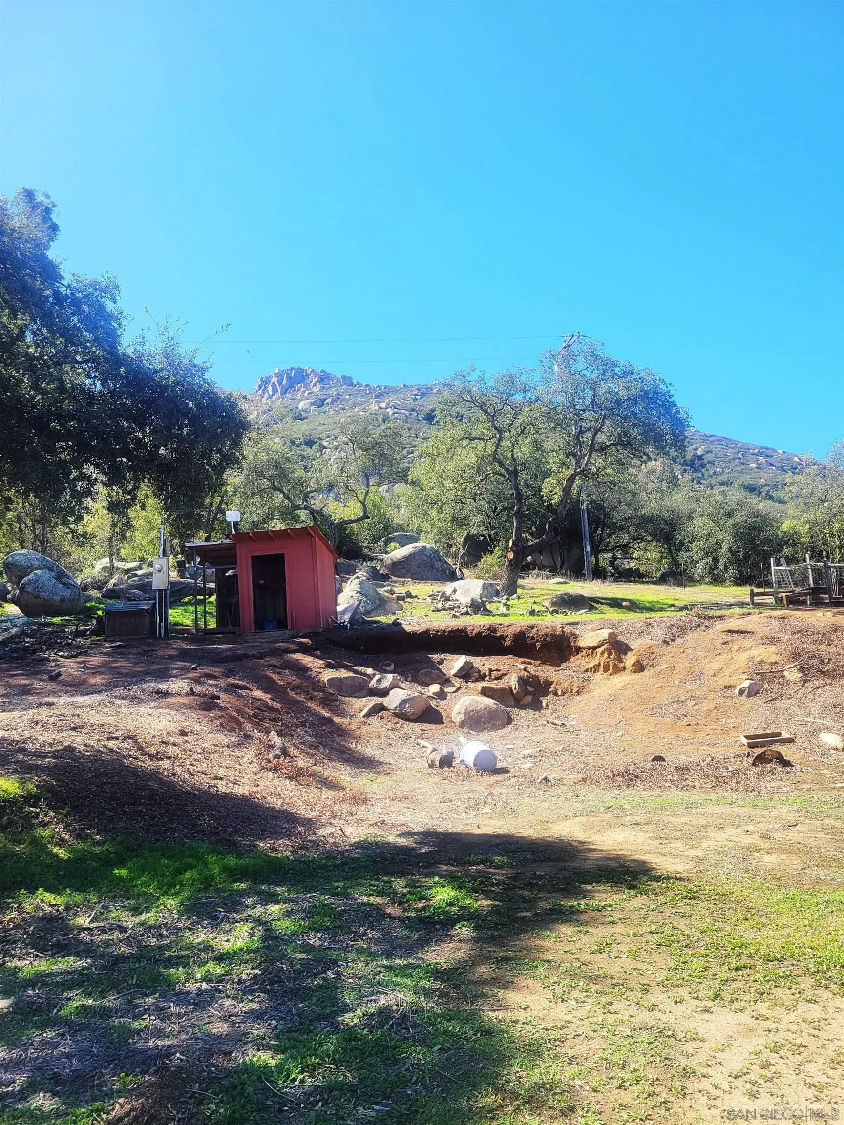 17869 Lyons Valley Road Jamul, CA 91935 - Photo 12 of 18 a view of a yard with a table and chairs