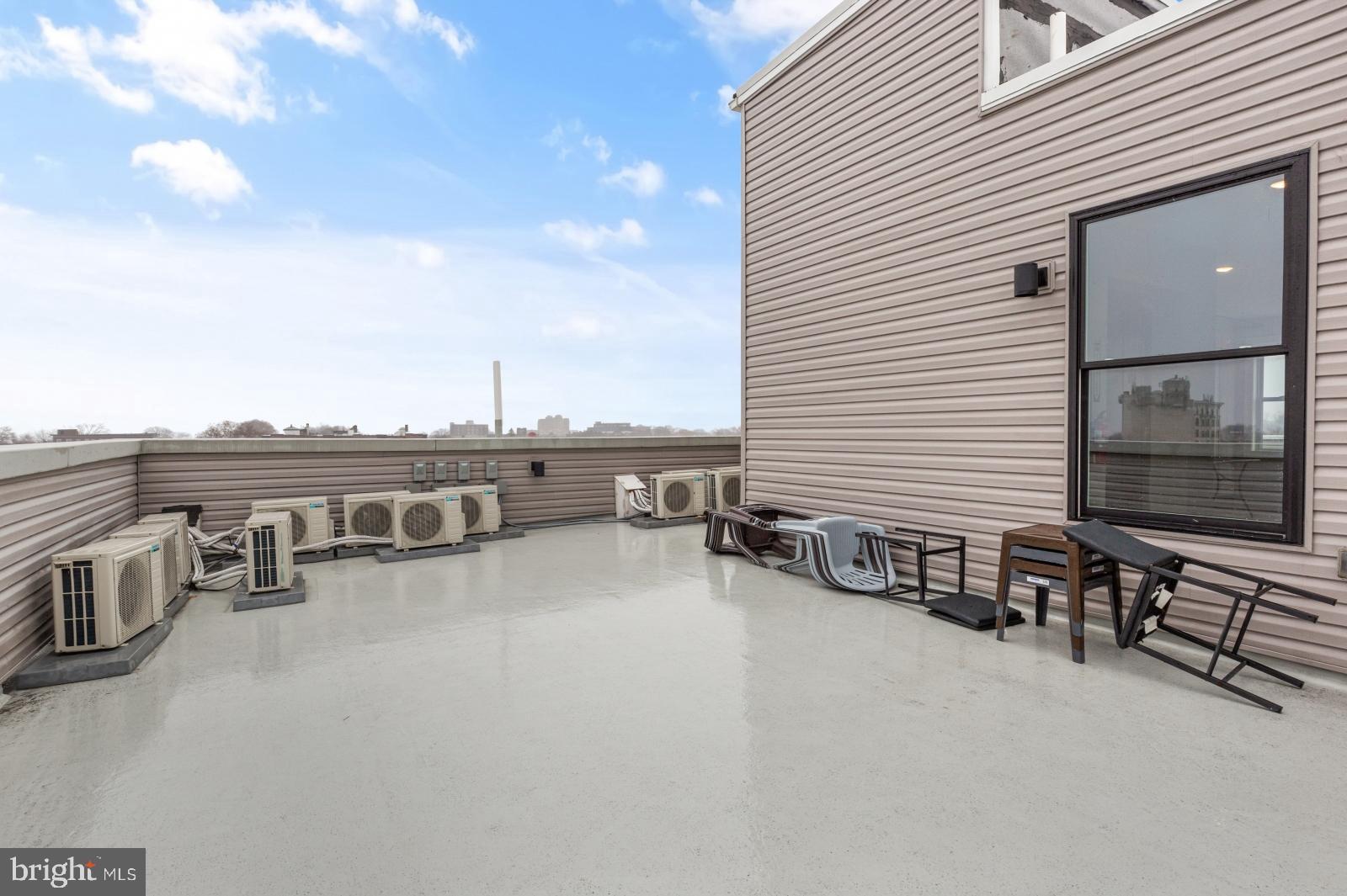 5230 Walnut Street, Unit 4R Philadelphia, PA 19139 - Photo 17 of 19 a view of a terrace with chairs
