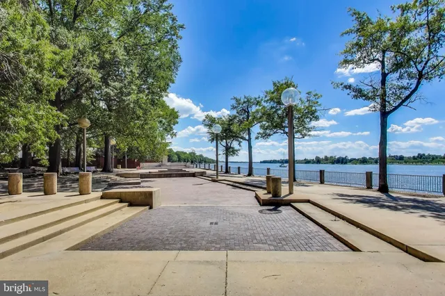 a view of lake with a yard