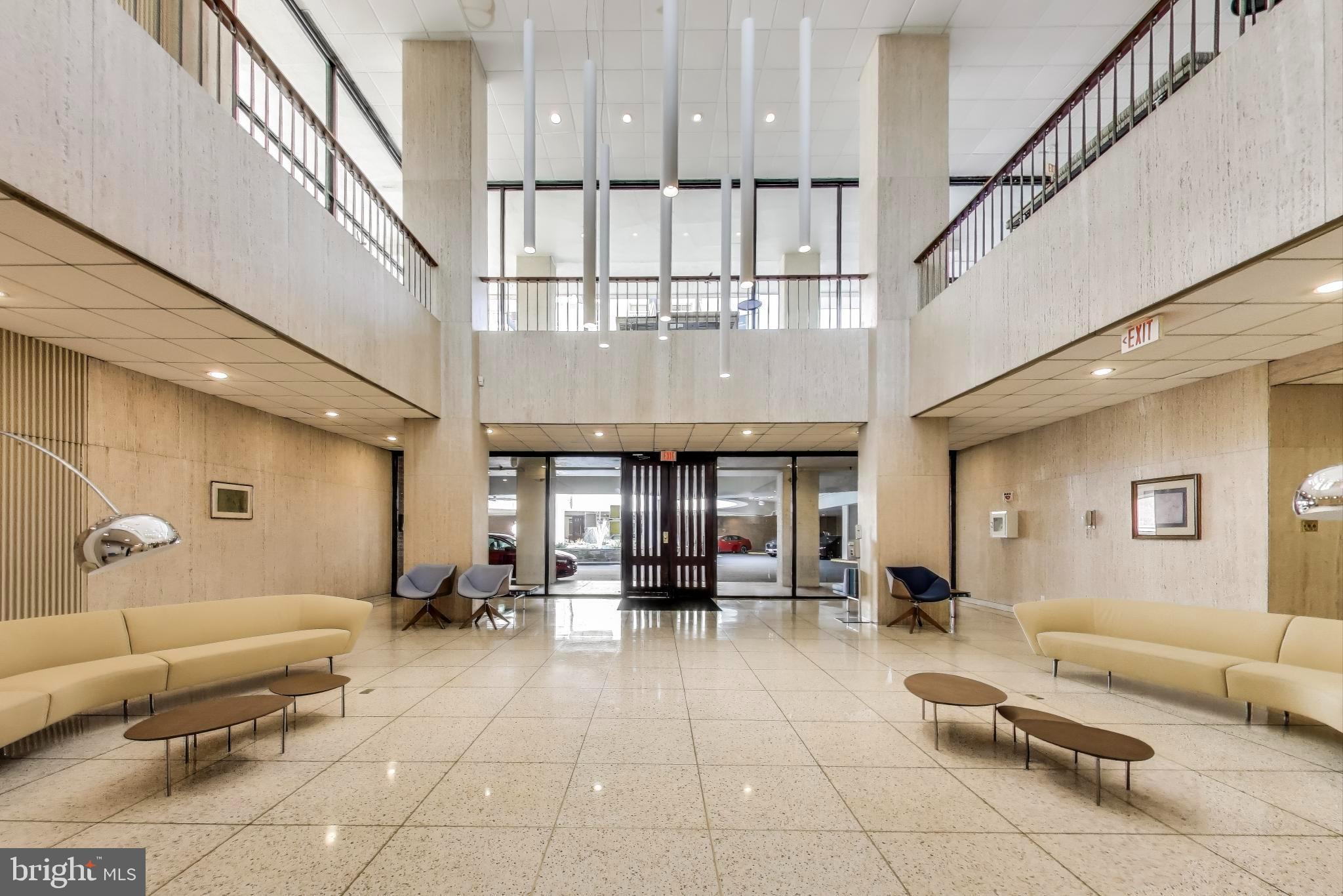 1435 4th Street Southwest, Unit B609 Washington, DC 20024 - Photo 4 of 28 a lobby with furniture and a potted plant