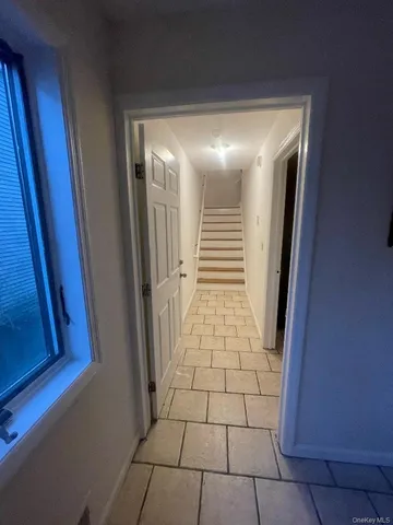 a bathroom with a sink a mirror and shower