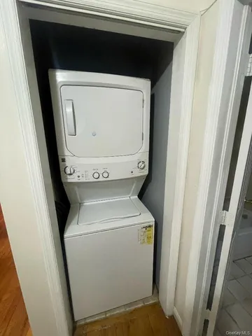 an empty room with a windows