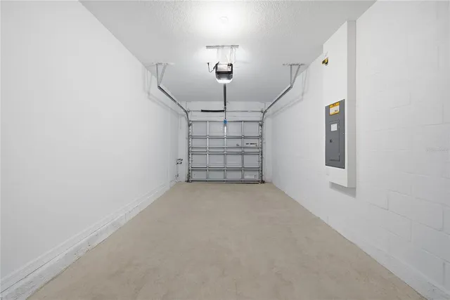 a view of a bathroom with sink and mirror