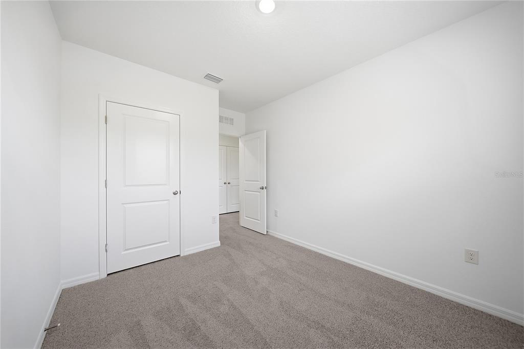 32497 Midsummer Night Lane Wesley Chapel, FL 33543 - Photo 19 of 30 a view of an empty room