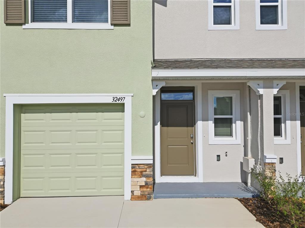 32497 Midsummer Night Lane Wesley Chapel, FL 33543 - Photo 2 of 30 view of front door of house