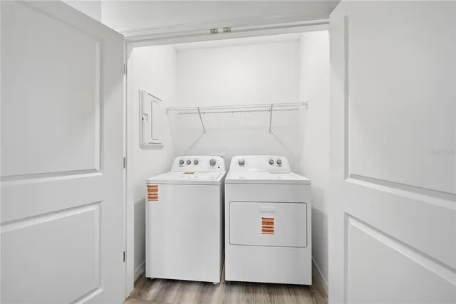 a view of a city with lots of trees