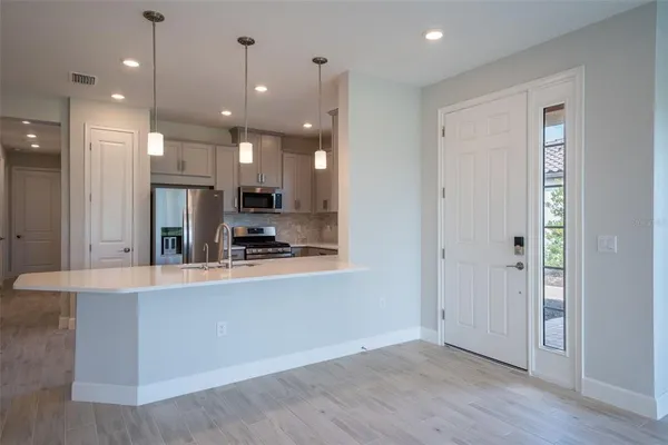 a view of a room with racks on the wall