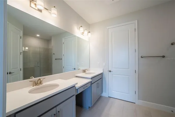 a view of a street with a building in the background