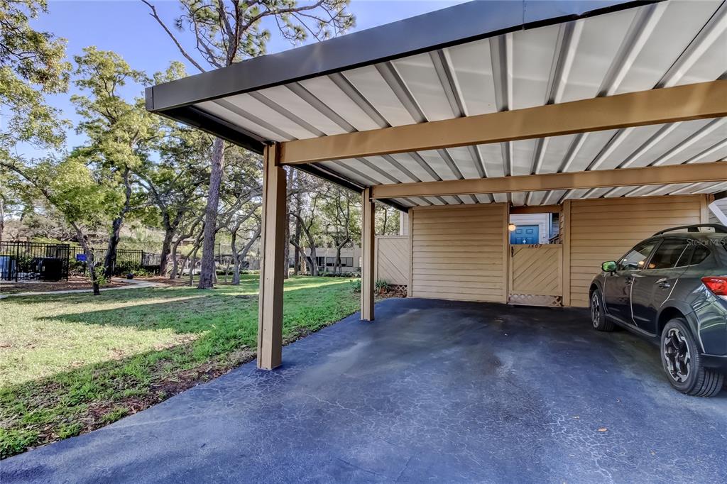 1407 Lennox Road East, Unit 1407 Palm Harbor, FL 34683 - Photo 37 of 48 a view of a car in garage