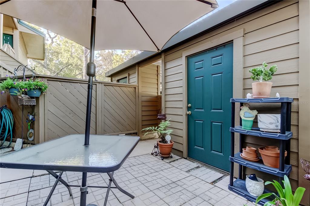1407 Lennox Road East, Unit 1407 Palm Harbor, FL 34683 - Photo 39 of 48 a view of an outdoor space with seating area