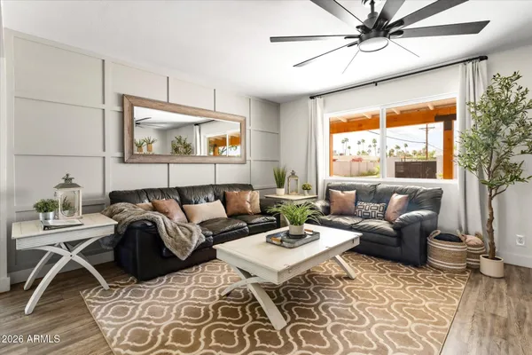 a kitchen with stainless steel appliances a stove and a microwave