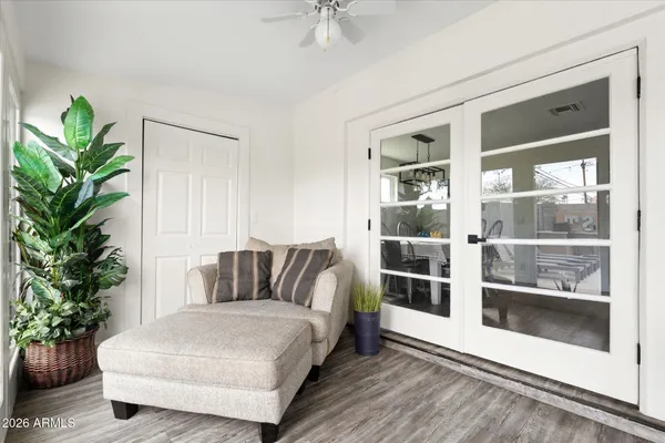 a view of a house with a yard patio and swimming pool