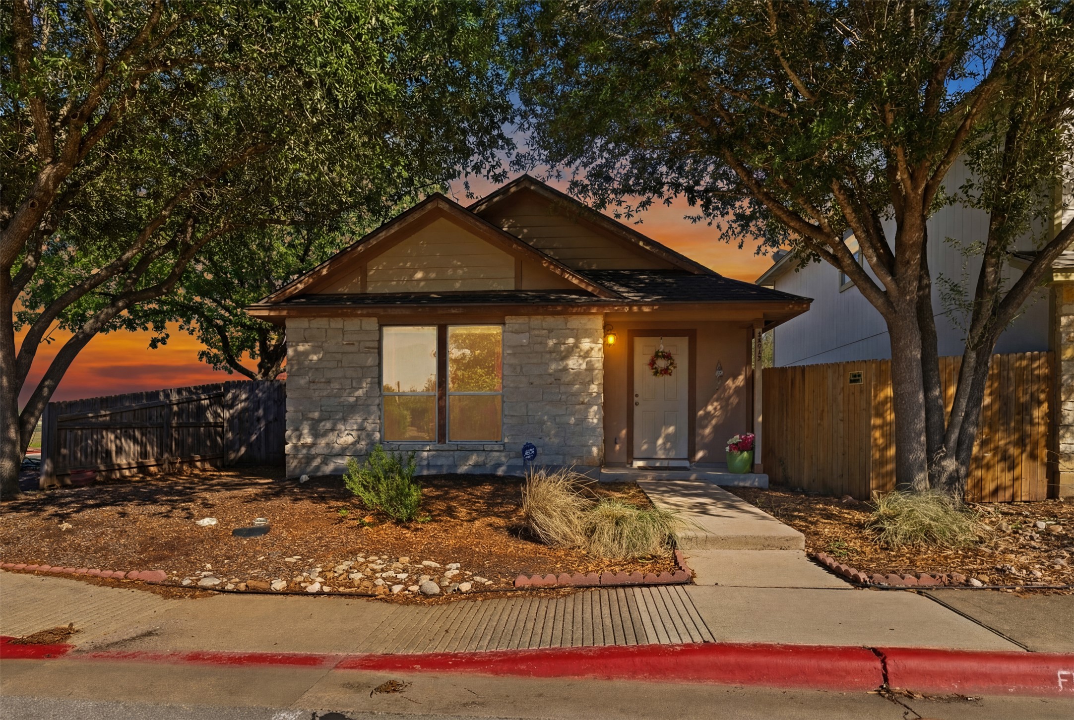4529 Secure Lane, Unit 31 Austin, TX 78725 - Photo 2 of 38 a front view of a house with a yard