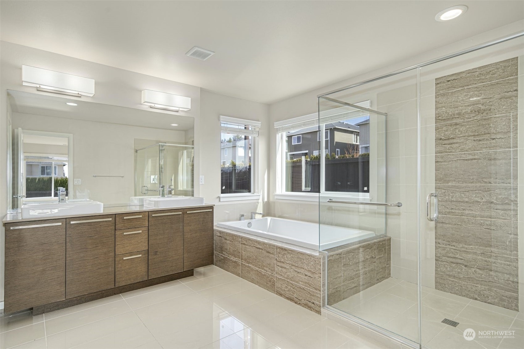 17025 40th Drive Southeast Bothell, WA 98012 - Photo 22 of 38 a bathroom with a large tub and shower