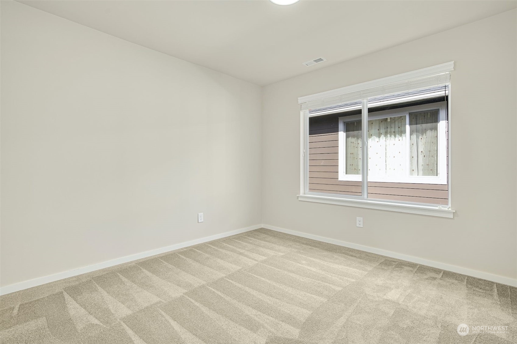 17025 40th Drive Southeast Bothell, WA 98012 - Photo 27 of 38 a view of an empty room with a window