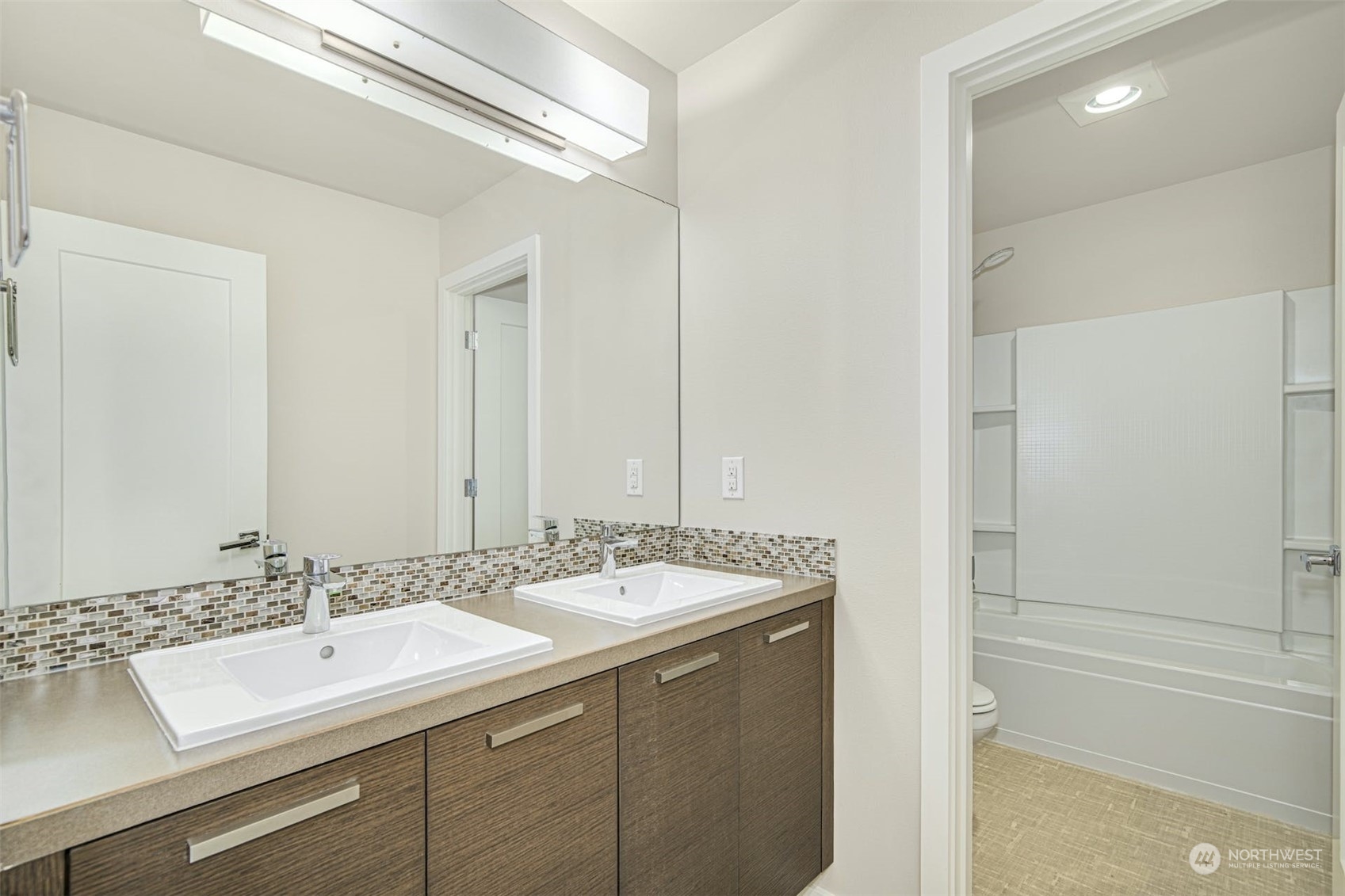 17025 40th Drive Southeast Bothell, WA 98012 - Photo 28 of 38 a bathroom with a sink and a mirror