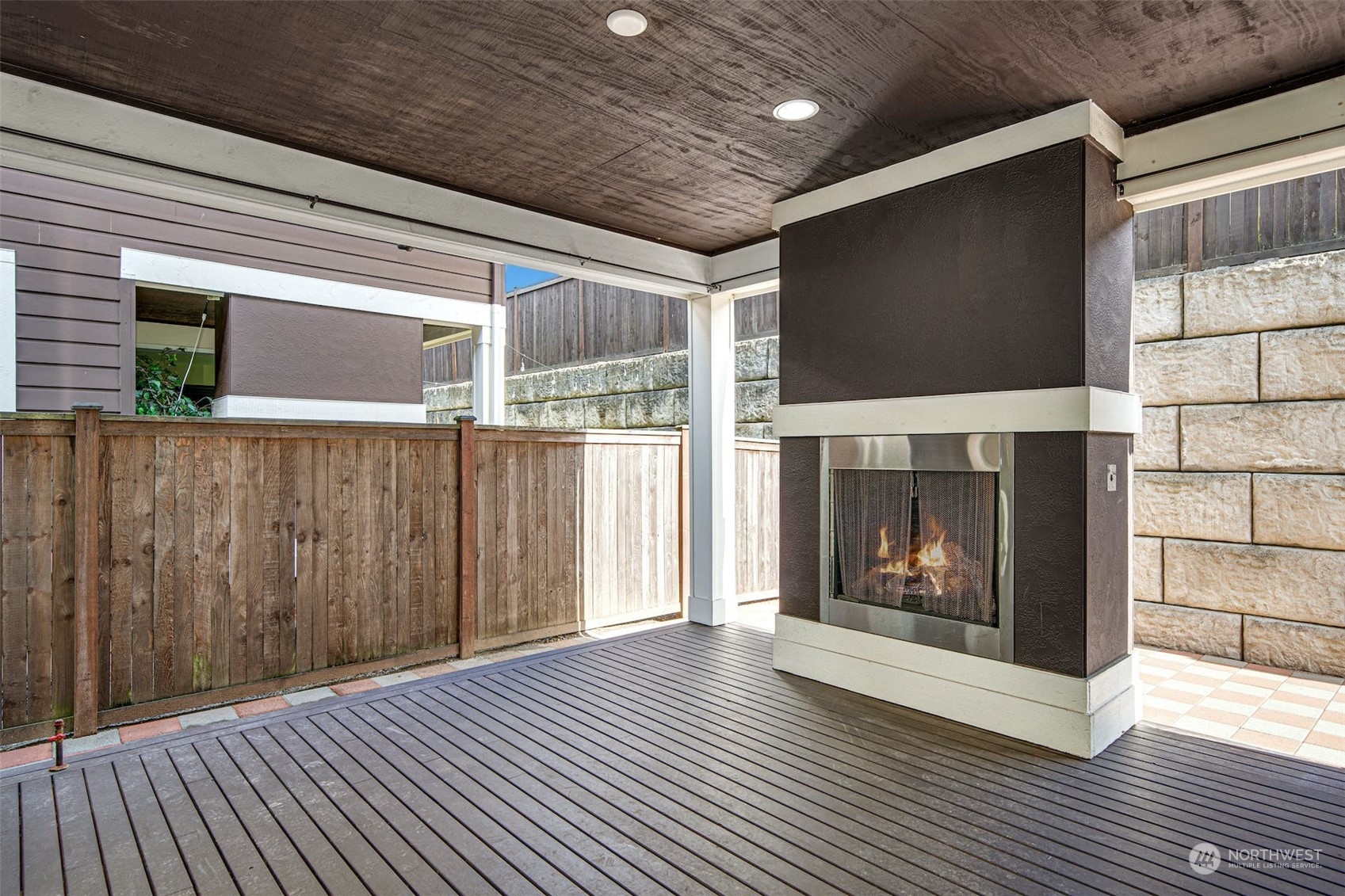 17025 40th Drive Southeast Bothell, WA 98012 - Photo 30 of 38 a view of a livingroom with wooden floor and a fireplace
